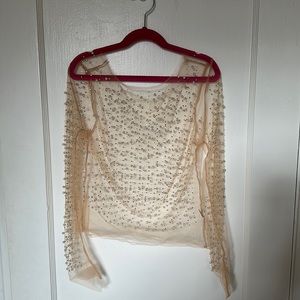 Sheer embellished long sleeve top. Size M